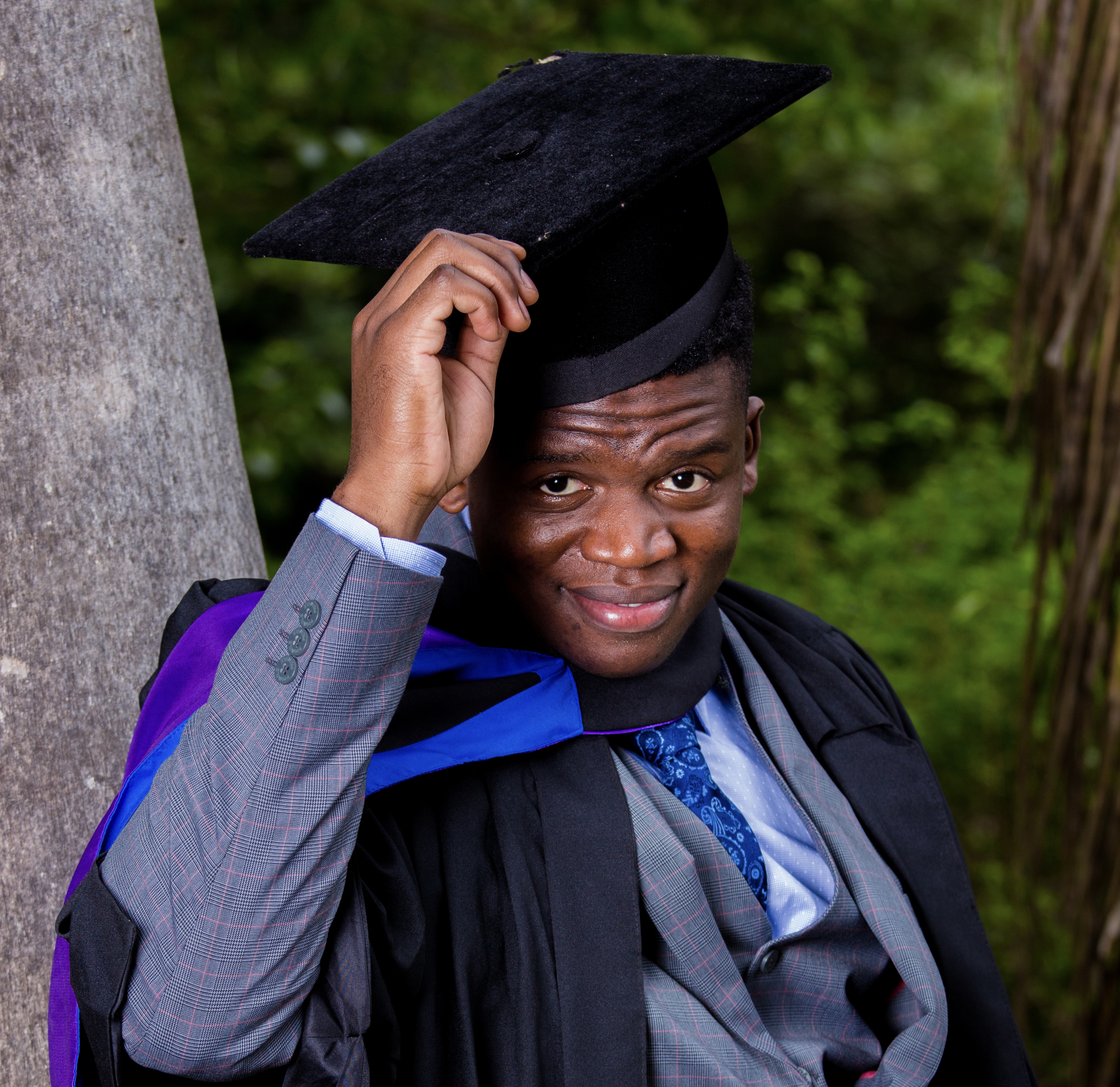 Professional headshot of Takudzwa Shumbamhini - Software Engineer & Consultant